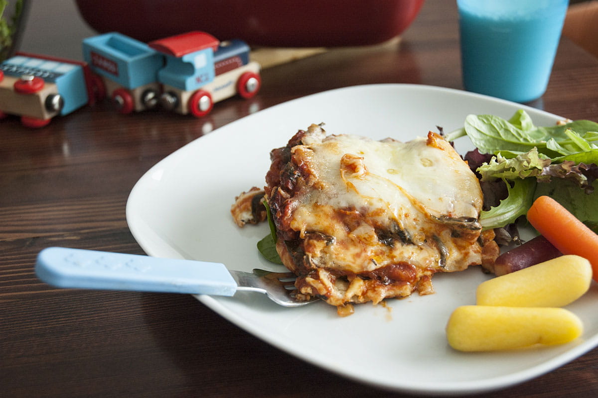 Piece of lasagna on plate