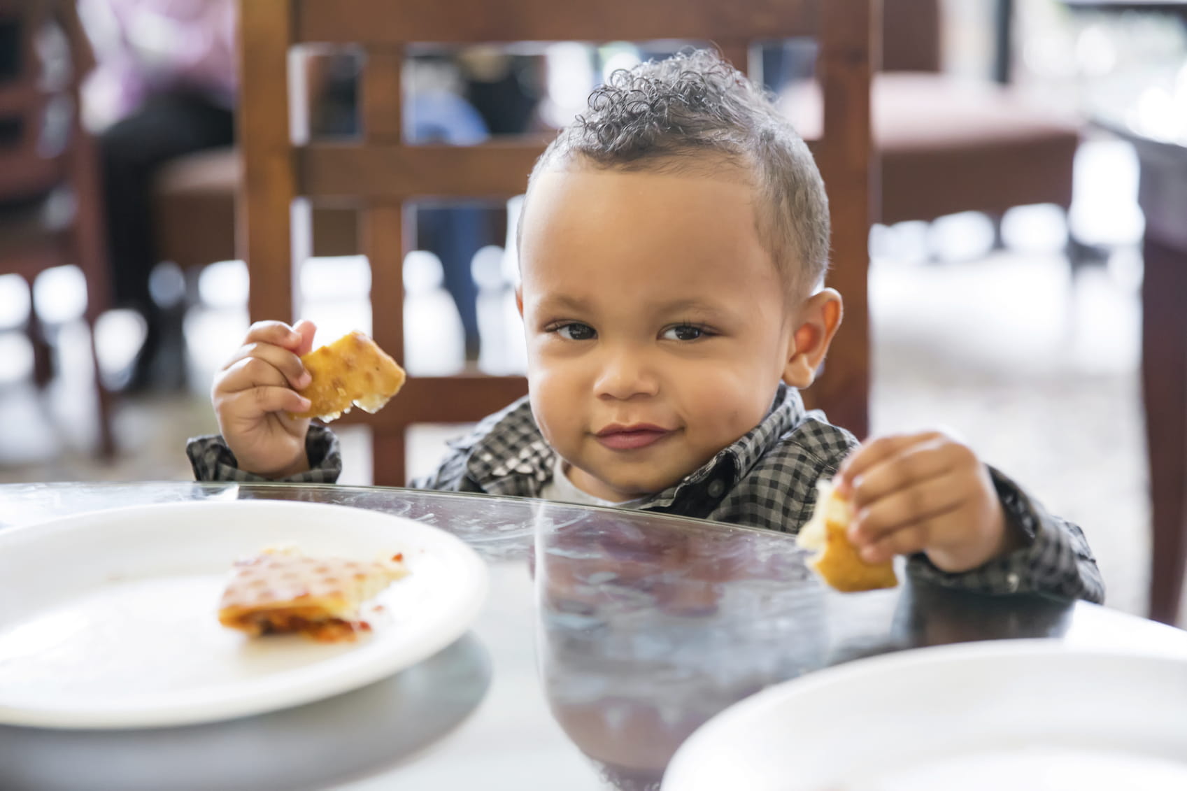 Make dining out pleasant for you, your toddler, and the table next to you. Photo © Jodi Jacobson