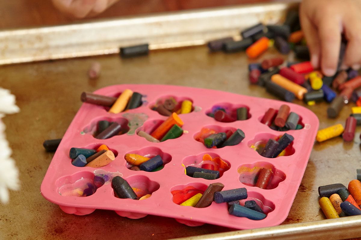 crayon nubs in pink tray