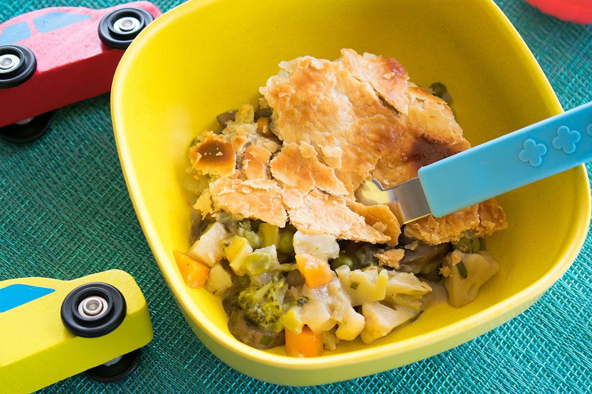 finished pot pie in bowl with toy cars