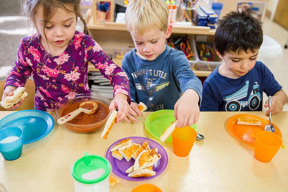 kids focusing on serving themselves