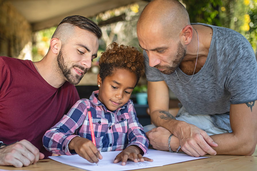 Parents helping child