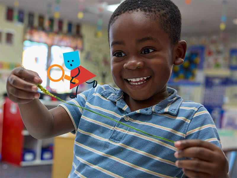 boy playing in classroom