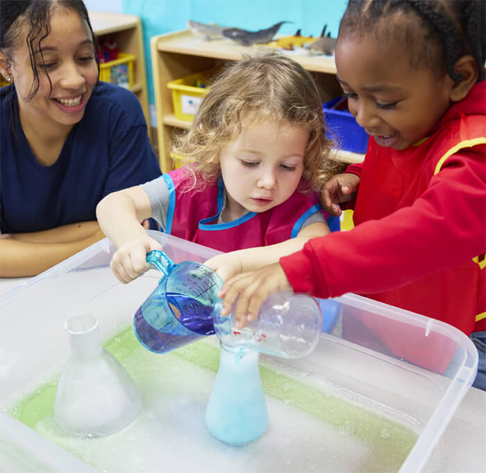 Kids playing with STEM project