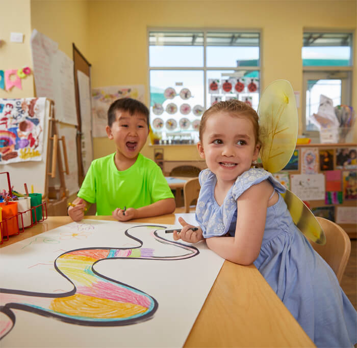 preschool kids in classroom making art