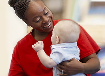 Teacher with infant