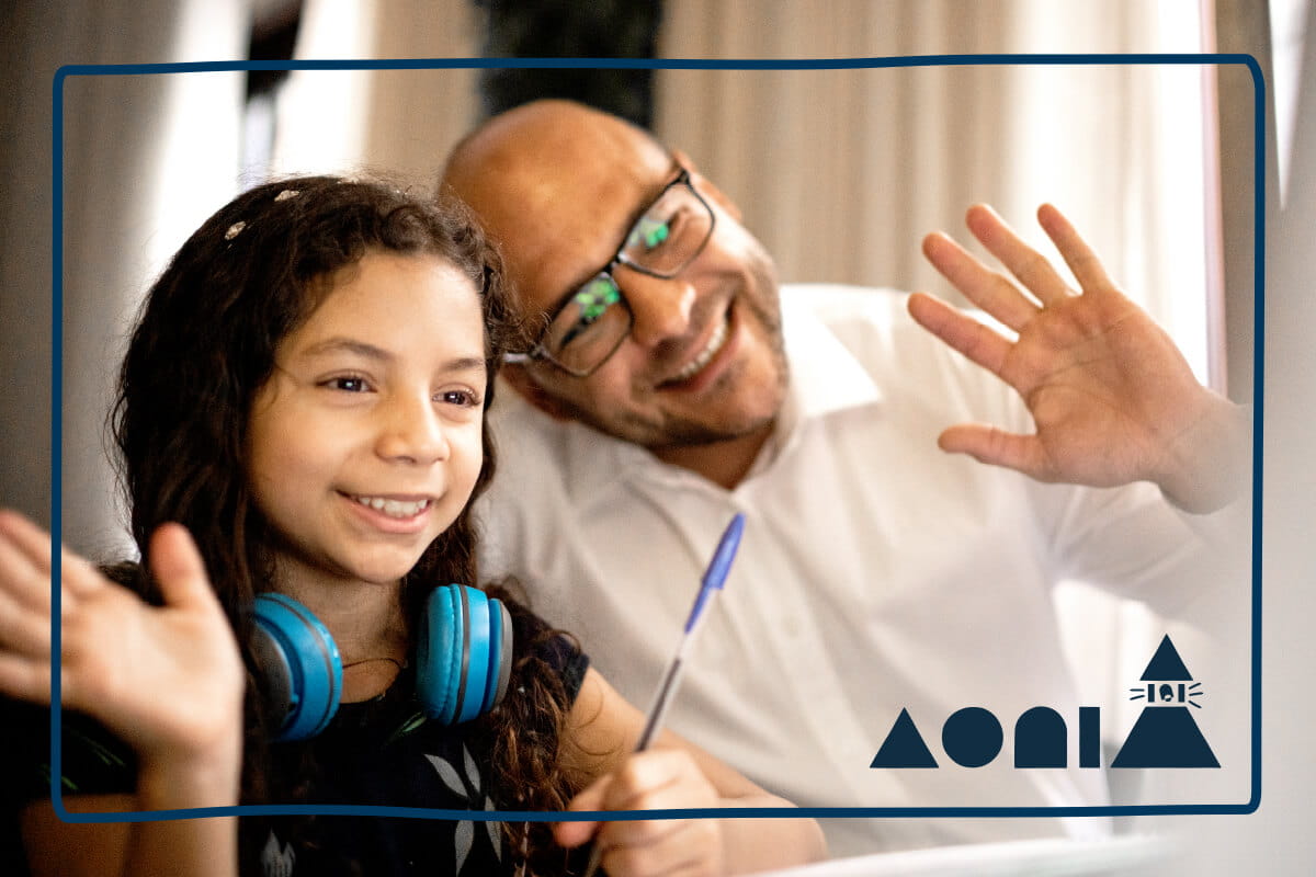 father and daughter waving