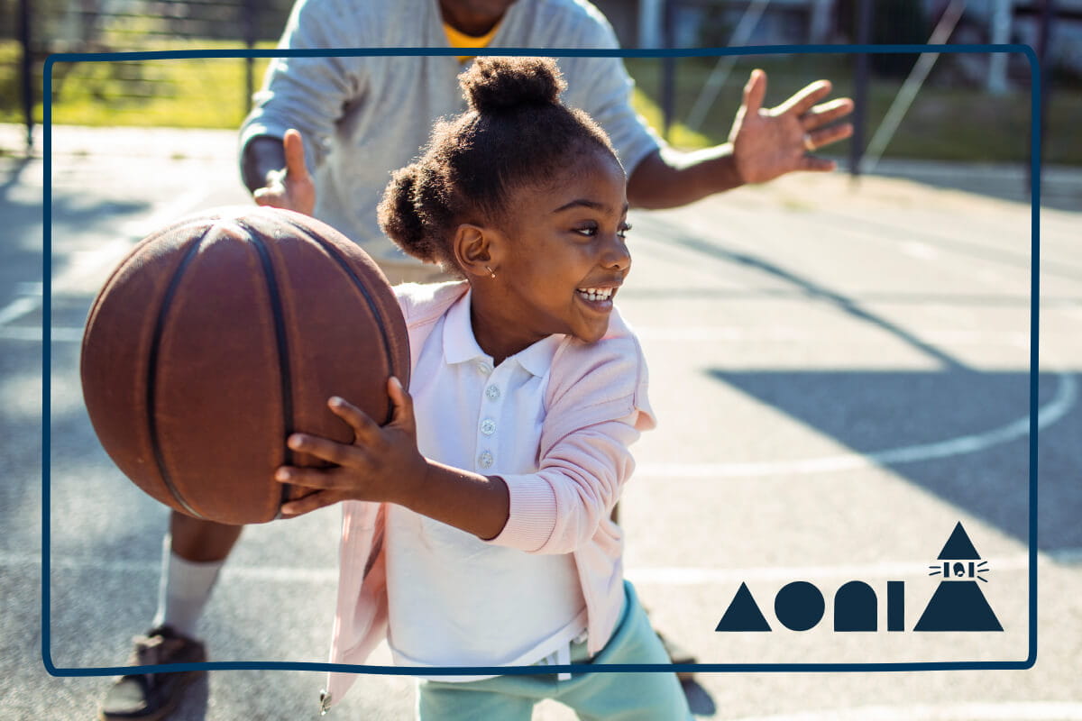girl playing basketball