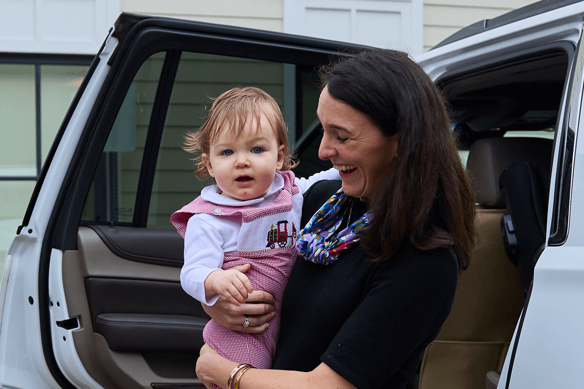 parent holding infant