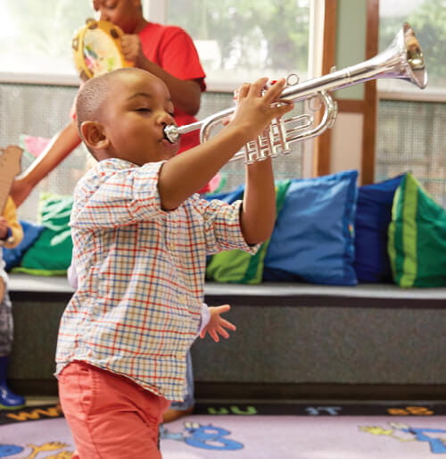 Boy playing trumpet