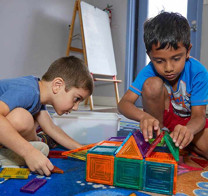 Prekindergartners playing together