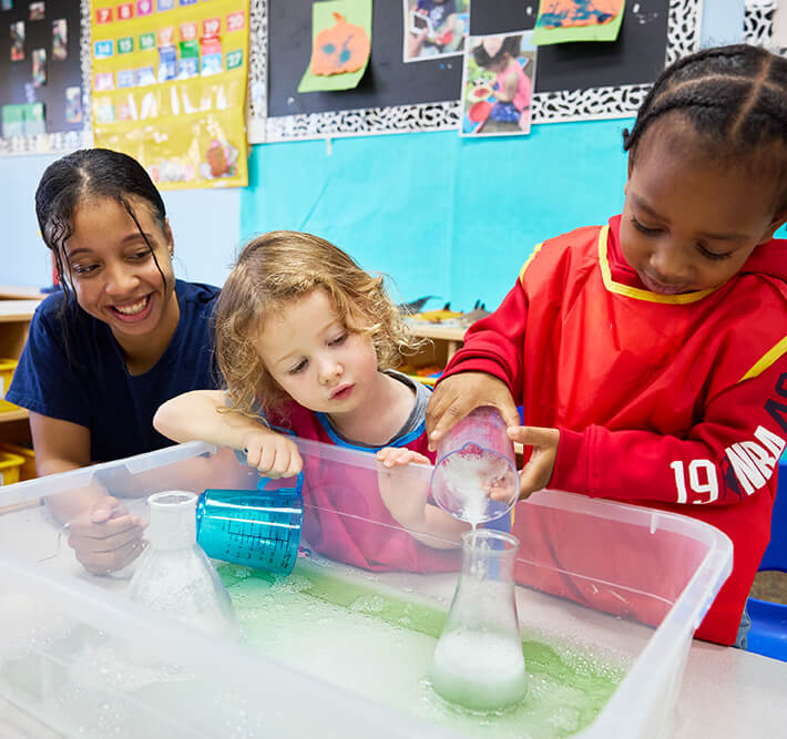 Preschool kids doing a science experiment