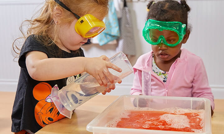 Preschool kids doing science experiment