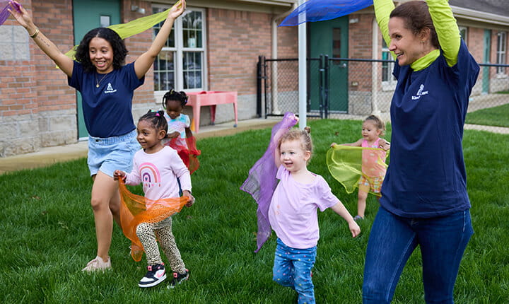 Preschool kids playing outside